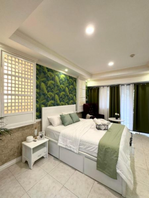 One Bedroom with Balcony by Christine Suites PH in Greenbelt Radisson